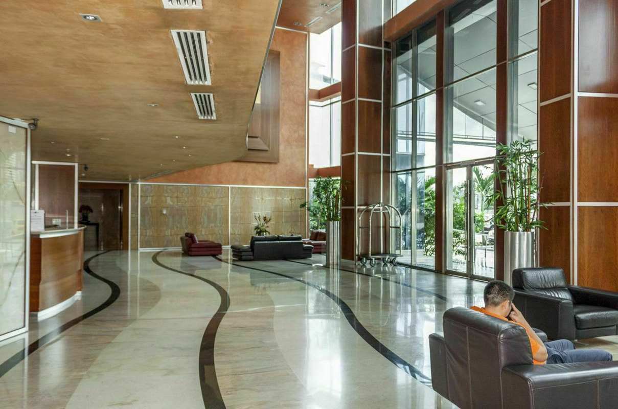 Outdoor terrace with private jacuzzi and ocean views at PH Ocean Club in Panama