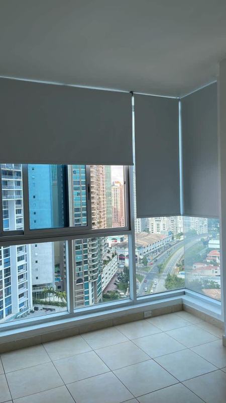 Kitchen with granite counters and wood cabinets at PH Ocean Club in Punta Pacifica Panama