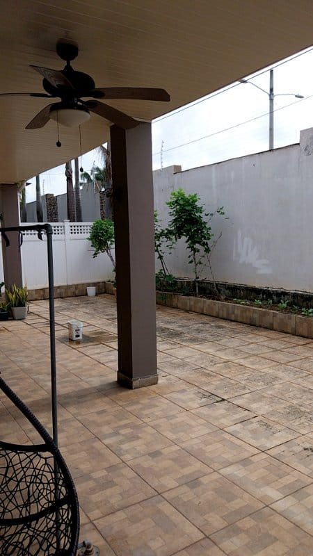 Spacious patio with ceiling fan and garden area in PH Mont Blanc Brisas del Golf Panama