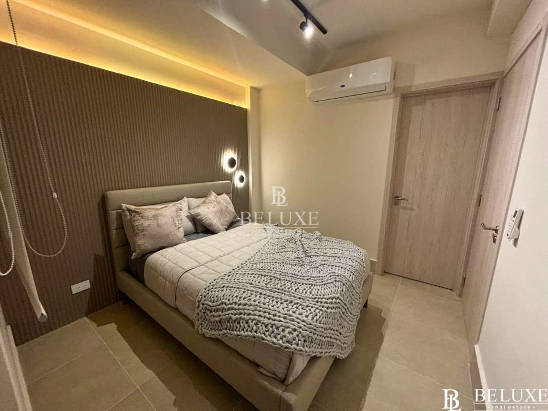 Dining space with modern furniture large window overlooking Santa Maria golf course