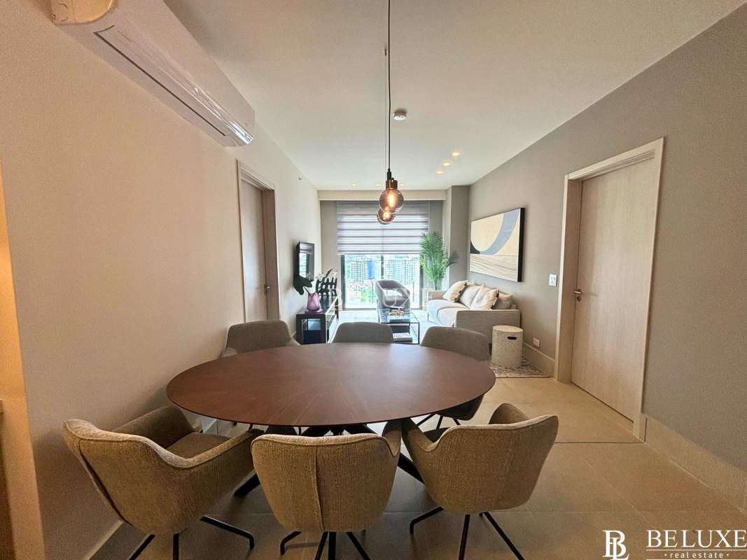 Modern furnished open kitchen with dining table in PH Ocean House Santa Maria Panama