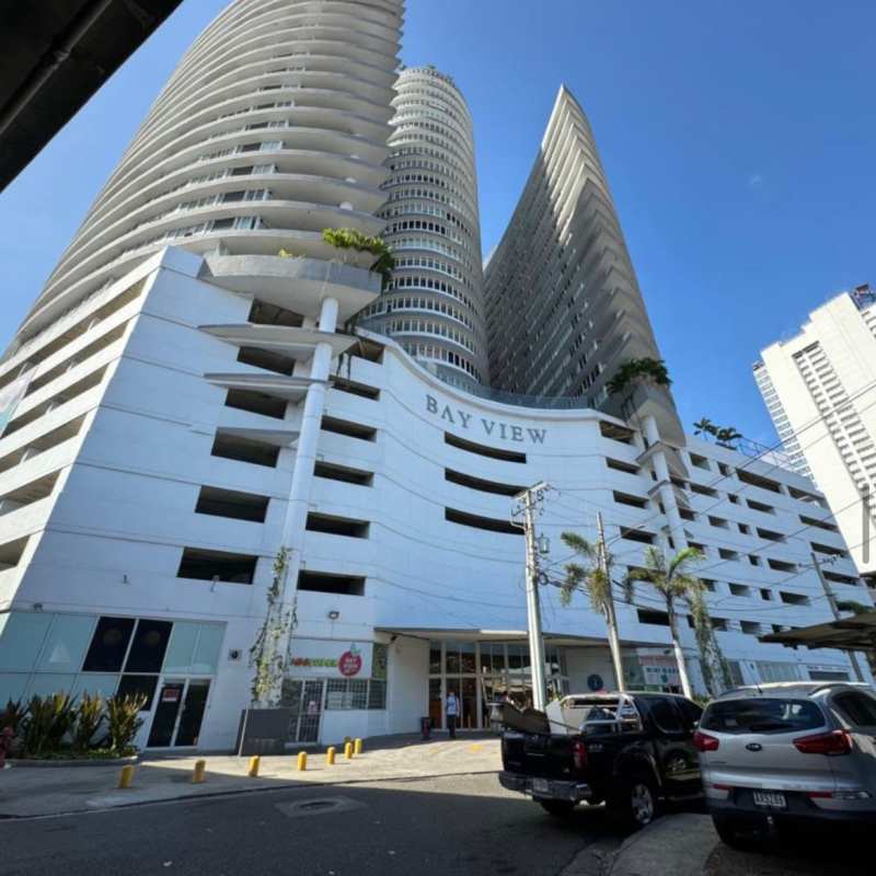 Modern curved facade with glass balconies PH Bay View on Avenida Balboa