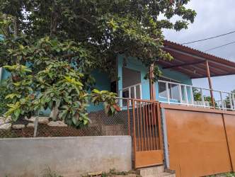 Contemporary remodeled kitchen with large window breakfast bar at Burunga house for sale