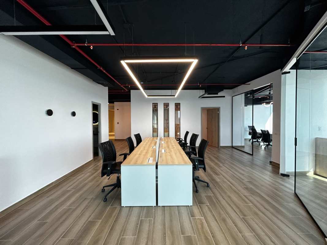 Reception desk area with modern lighting in Financial Park office Costa del Este Panama
