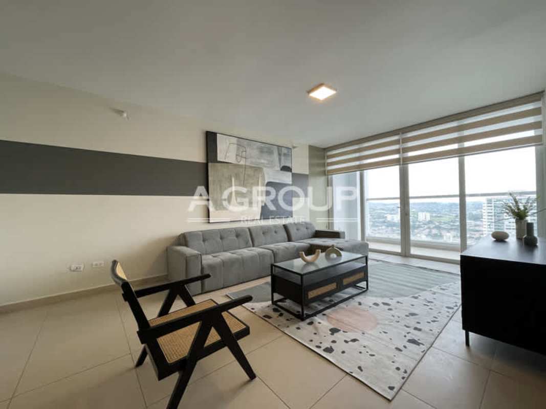 Modern living room with panoramic windows in furnished apartment PH Country Club Costa del Este Panama