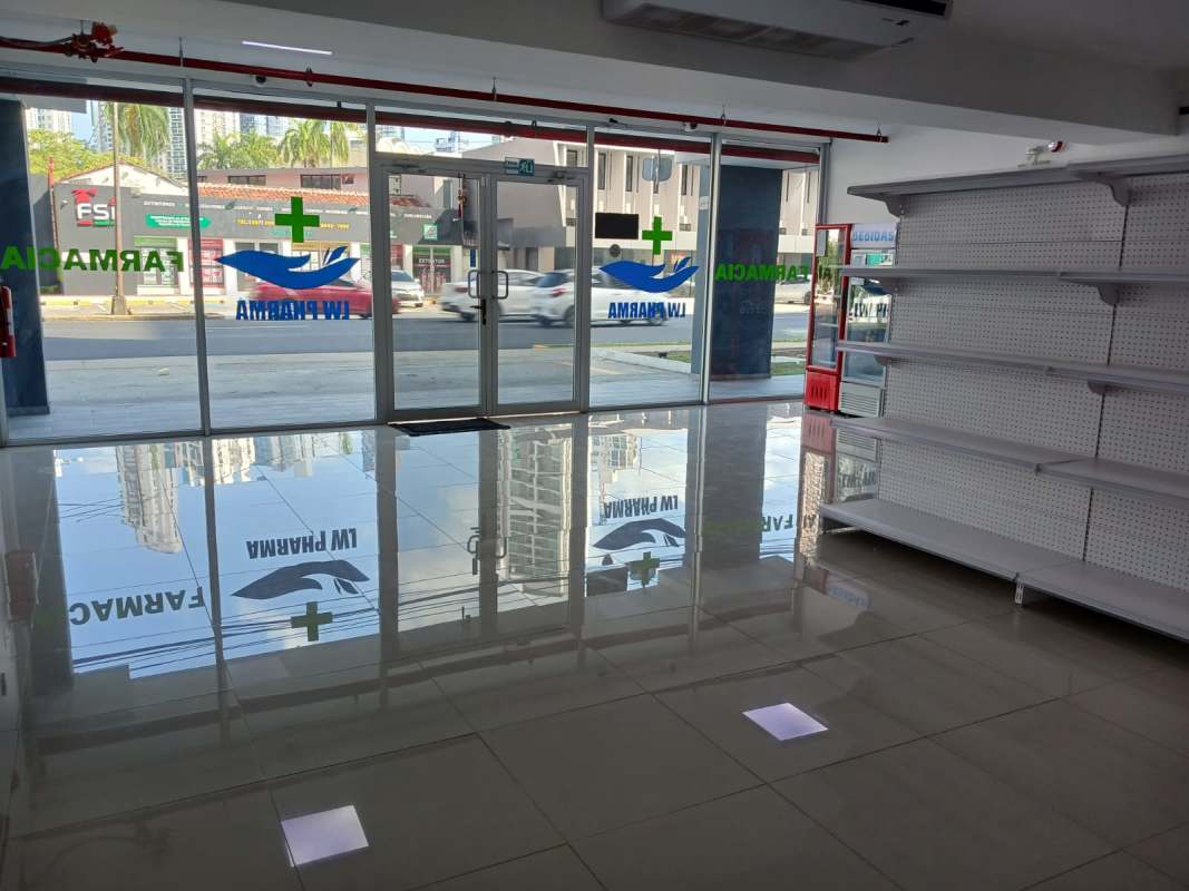 Store area empty shelving glass entrance commercial rental Signature Point Plaza Panama