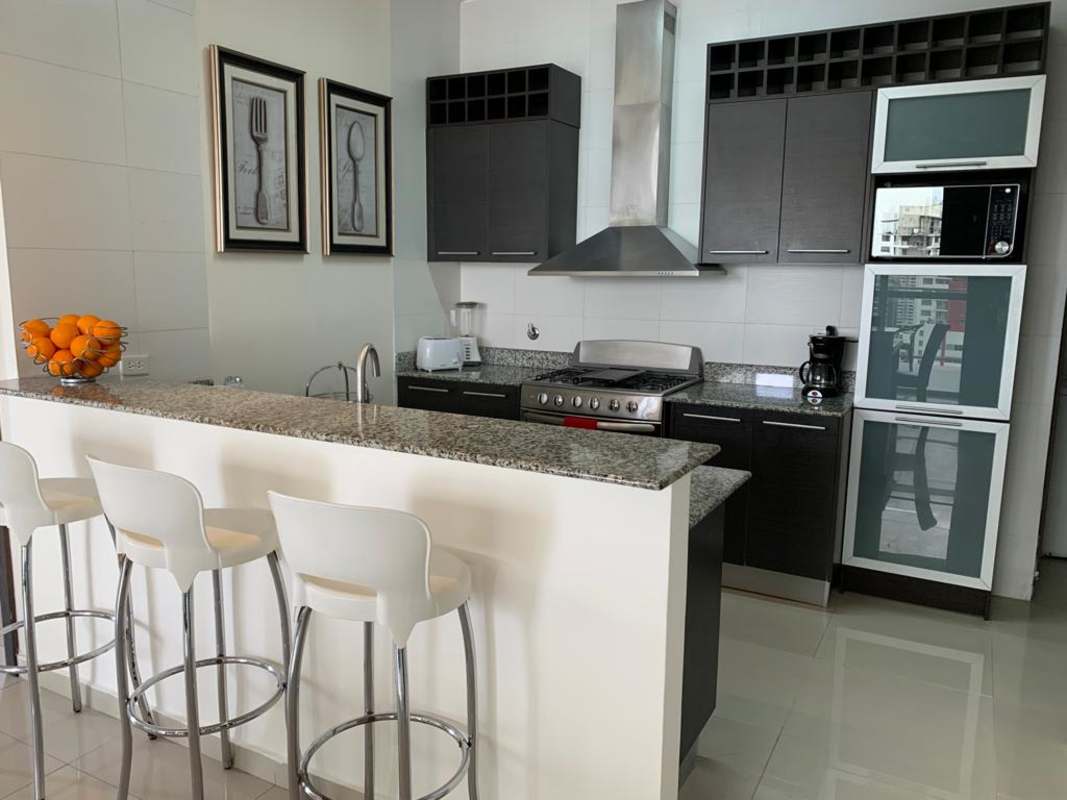 Balcony with jacuzzi overlooking Panama City skyline at PH Quadrat San Francisco