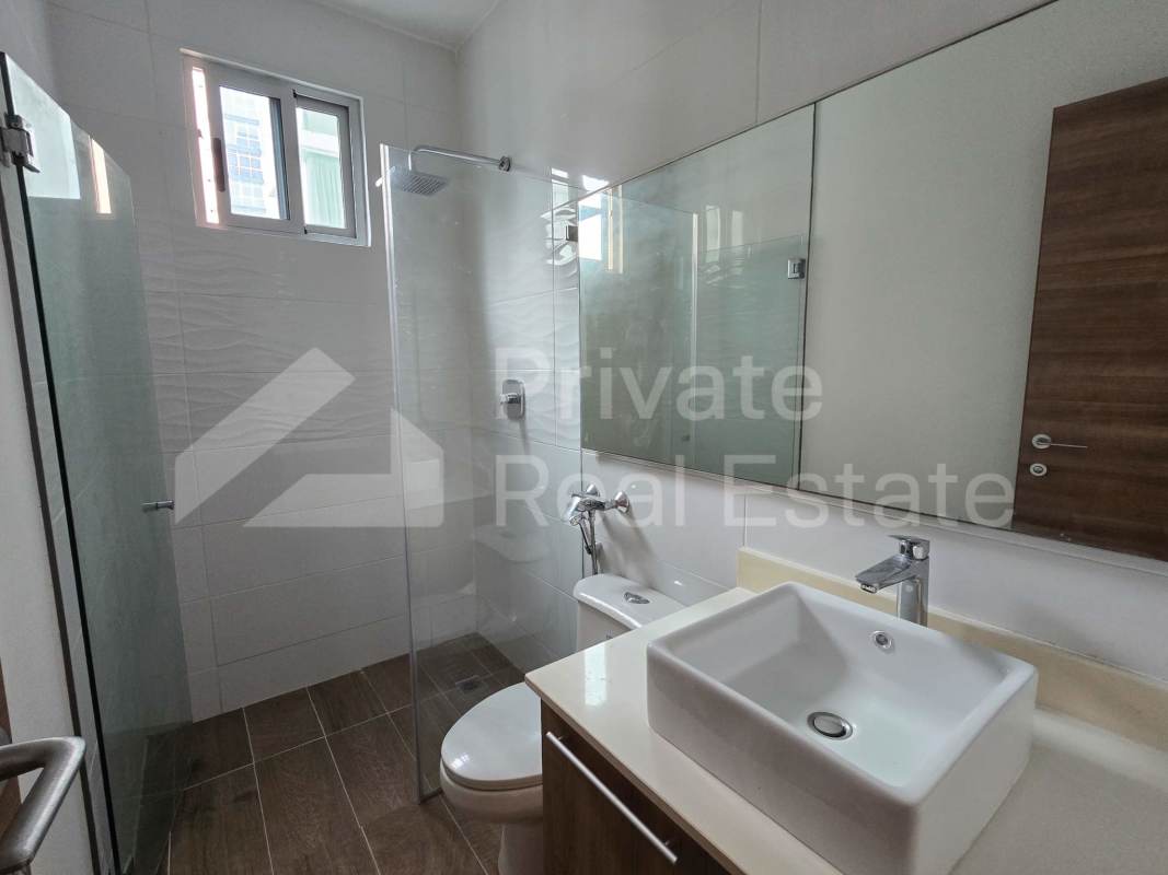 Bright master bedroom with large window city views and closet in PH Dynasty Panama