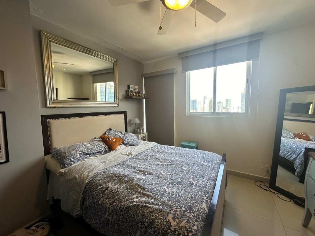 Double level hallway with mezzanine den glass railing marble floors PH Miyaki Penthouse Panama