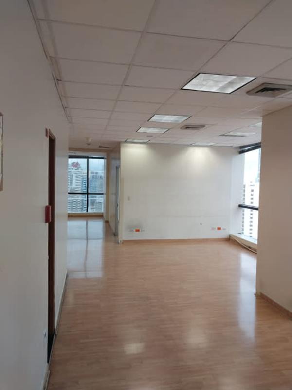 Glass partition modern office interiors with city views in PH Plaza Banco General Panama City
