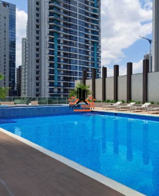 Infinity pool with skyline views and sundeck at PH Allure at the Park Panama City