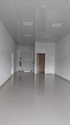 Unfinished white walls and tiled floors in ground floor commercial unit Costa Verde