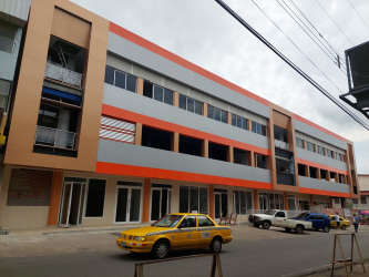 Street view of modern commercial building with shops and offices in Costa Verde La Chorrera