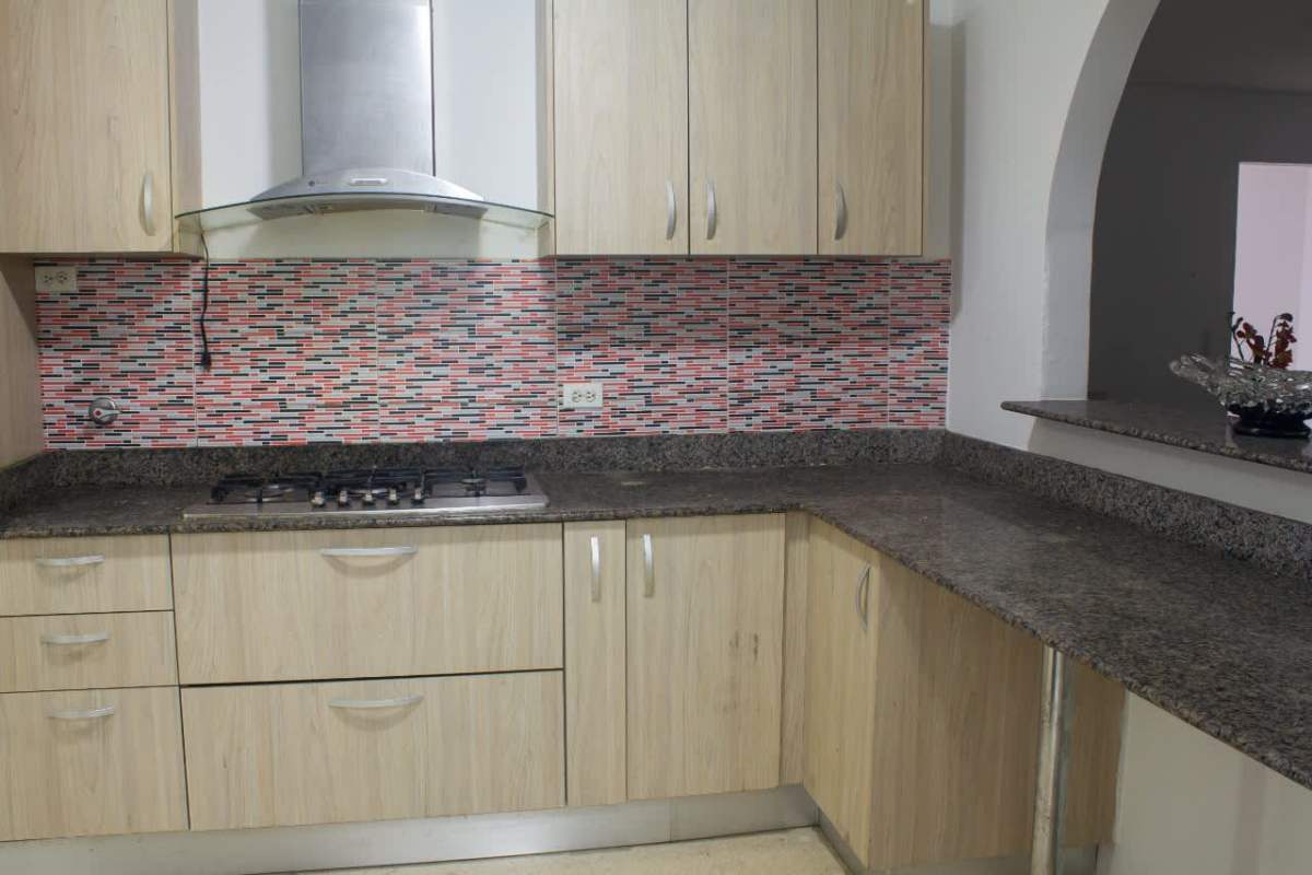 Dining area with pass-through arch and six chairs in PH Del Rey El Cangrejo Panama