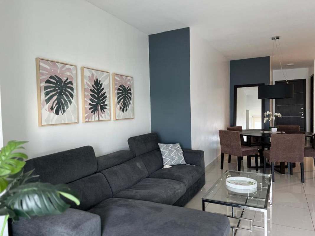 Spacious master bedroom with king bed, large windows, ocean view balcony access PH BICSA Financial Center Panama