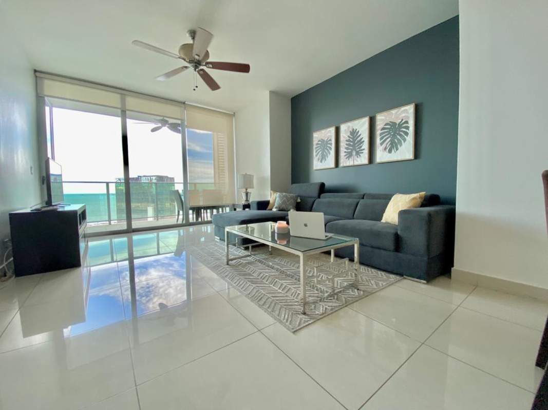 Fully equipped open kitchen with bar seating modern cabinetry in PH BICSA Financial Center Panama