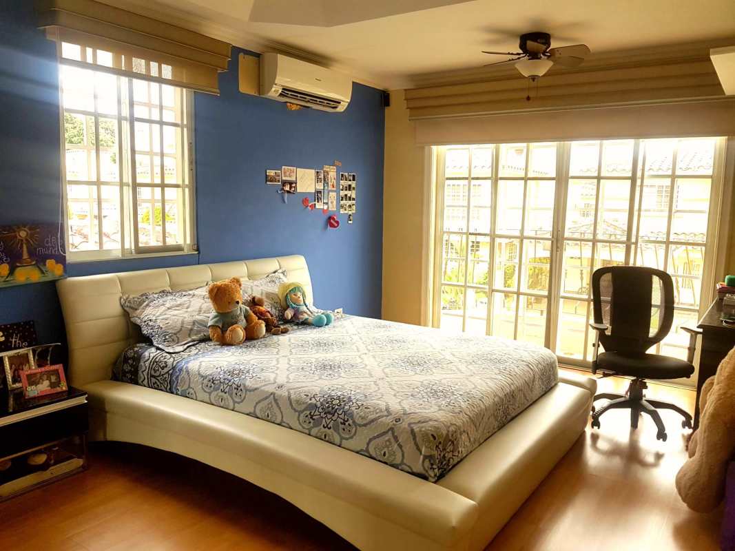 Bathroom offering double vanity, glass shower and beige tiles in The Spring Panama