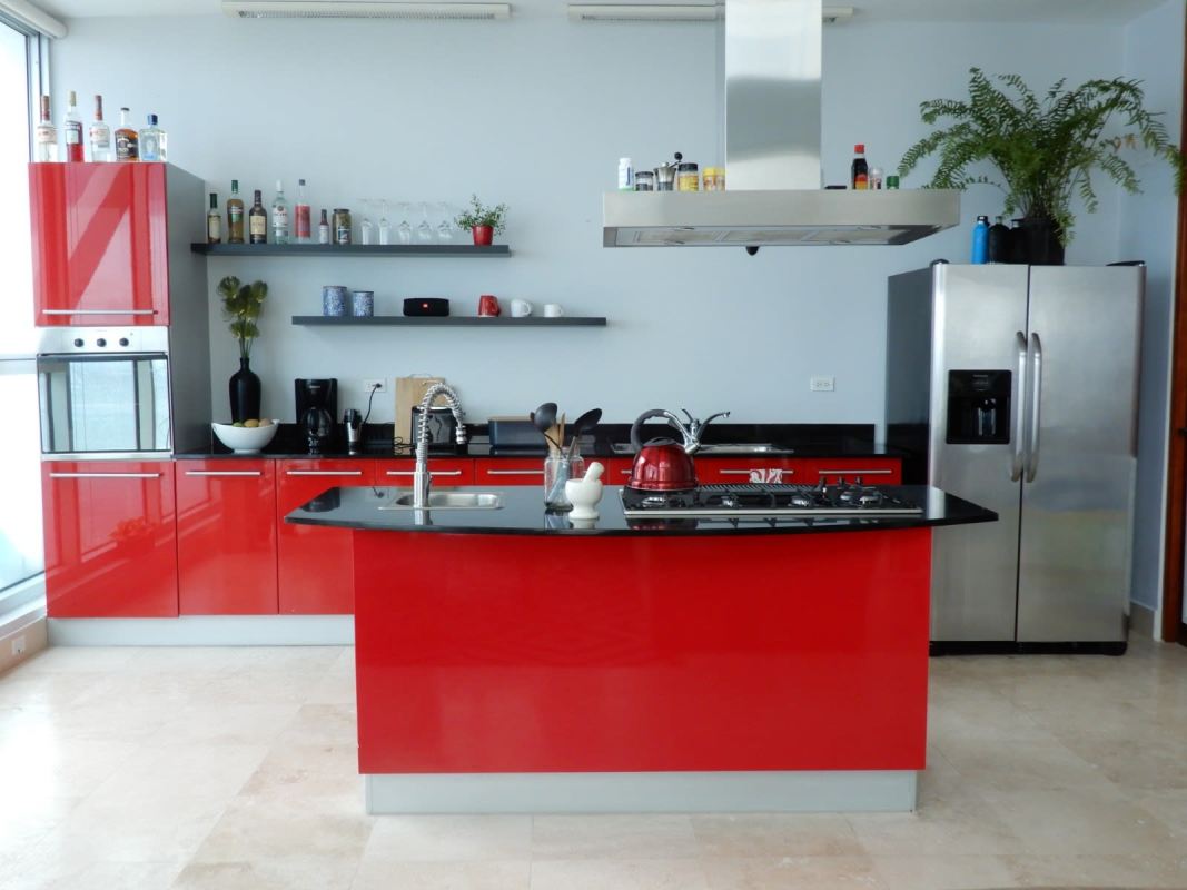 Modern granite open kitchen with island and stainless appliances in PH Pacific Point Punta Pacifica Panama City