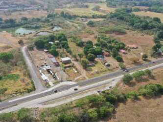 Aerial roadside land view by Quesos Mili and Terpel gas station on Interamericana Highway Panama