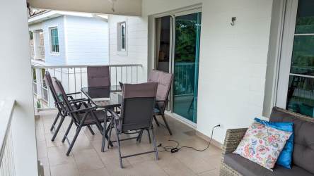 Bright open-concept living and dining area with coastal decor PH Howard Bijao Panama