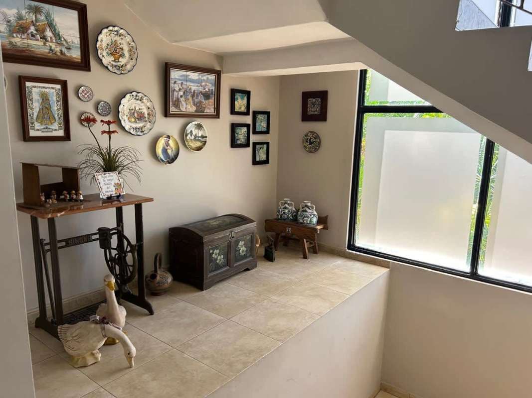 Two-story Mediterranean house, garden with mature trees, driveway and street parking El Carmen Panama