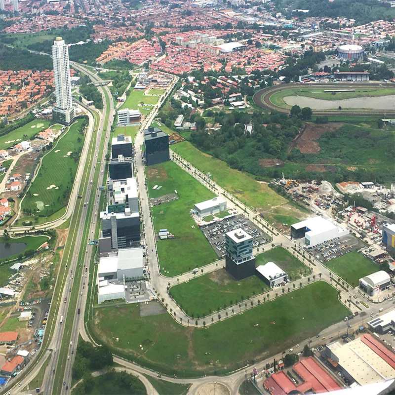 Mixed-use development aerial showing towers, green spaces, roads near Santa María Business District Panama