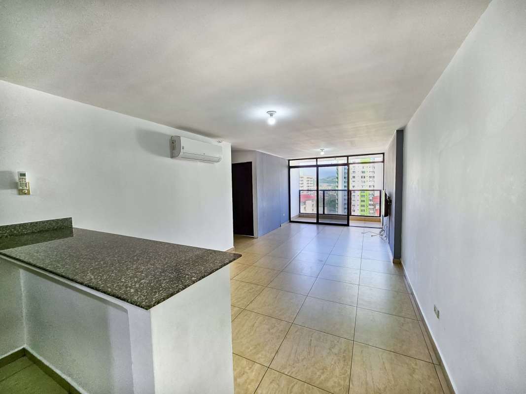 Kitchen with granite breakfast bar and modern cabinets PH Terrazas del Rey