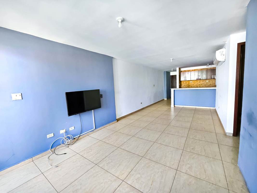 Apartment balcony with views over Condado del Rey cityscape Panama City