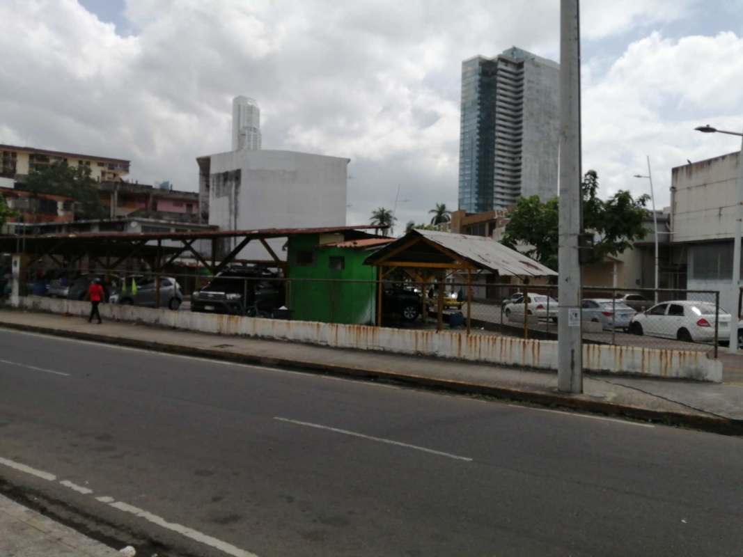 City street view with commercial buildings and empty construction lot on Avenue Justo Arosemena Calidonia Panama