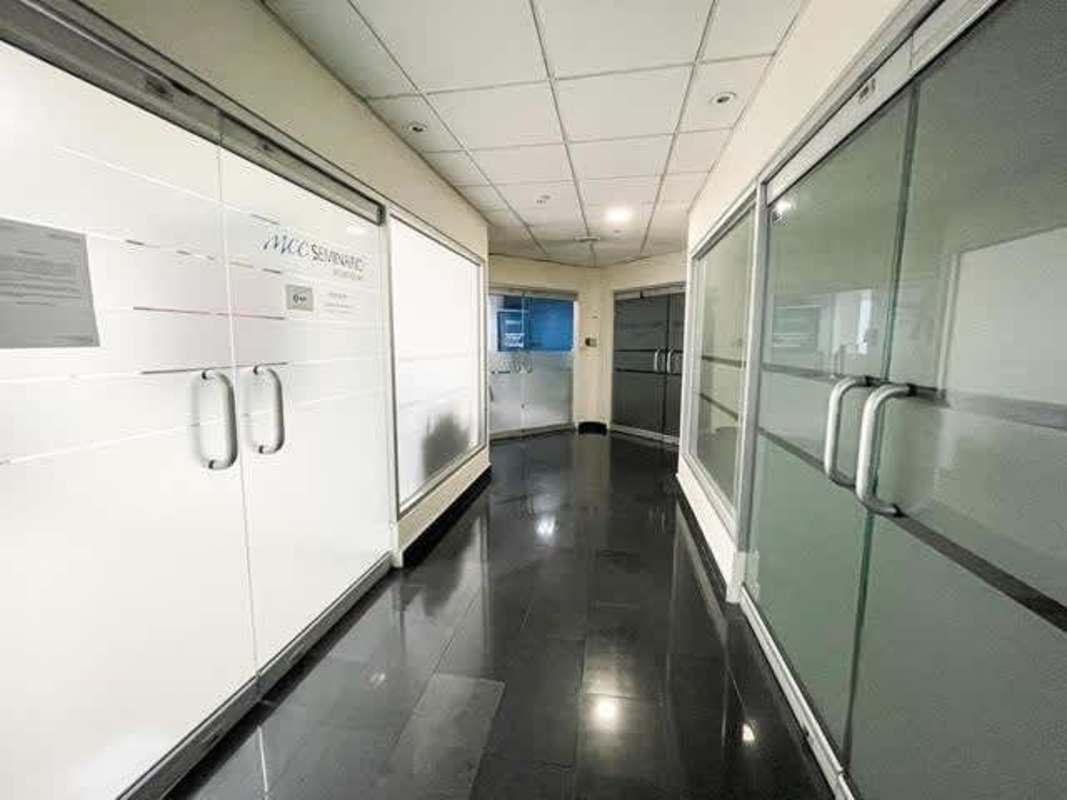 Commercial building elevator lobby with marble and granite finishes Banesco Tower