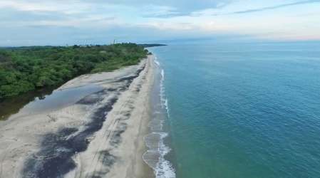 Direct sandy beach access with lush landscaping and views of Pacific coast in Panama