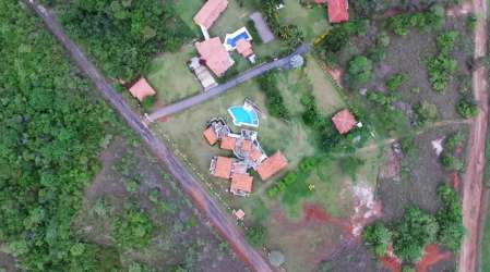 Panoramic aerial image of beachfront Mediterranean estate and Pacific coast in Panama