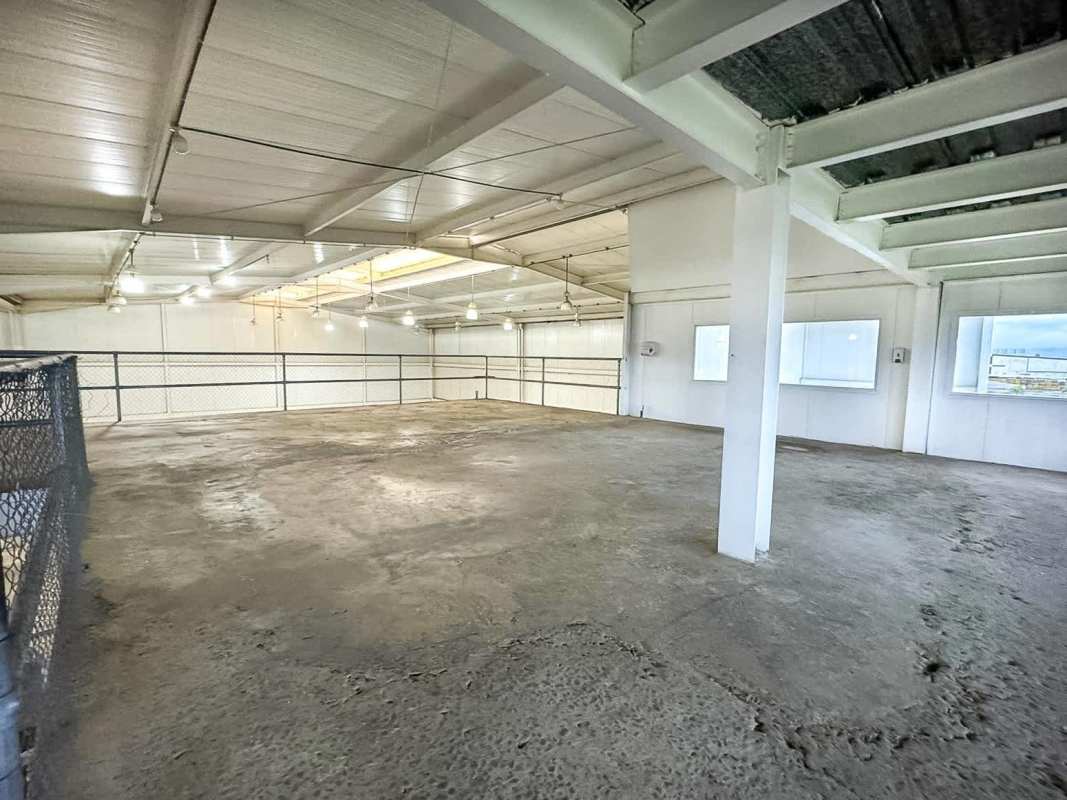 Empty industrial warehouse mezzanine with safety chain link in Parque Industrial Las Americas Panama