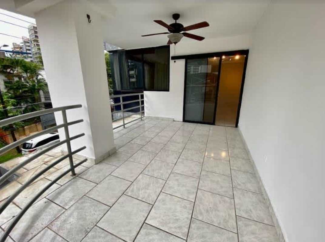 Minimal bedroom with ceiling fan, tiled floor PH Midtown El Cangrejo Panama