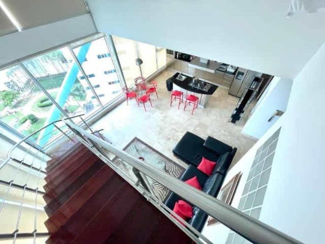 Contemporary kitchen with granite countertops, island, stainless appliances in PH Loft Four 41 Panama