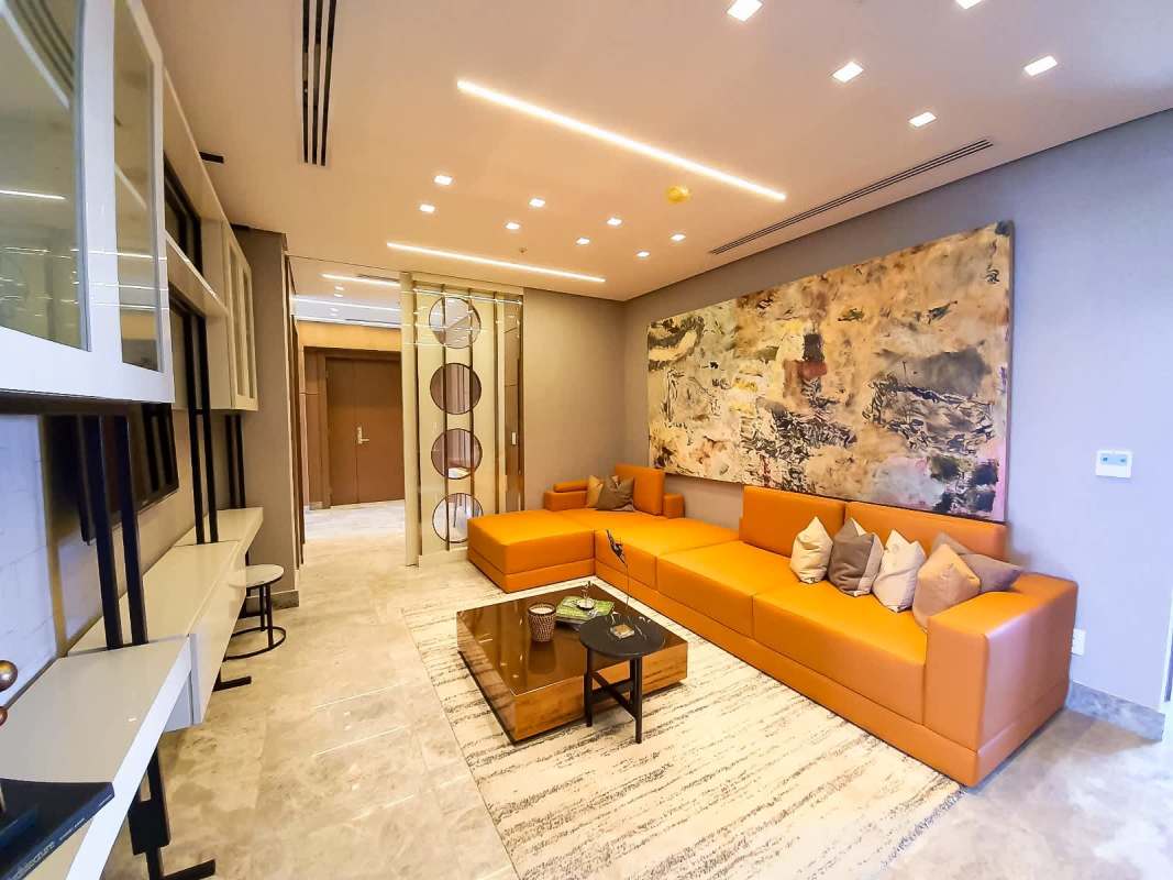 Infinity rooftop pool surrounded by lounge area overlooking golf and city PH Empire Residences