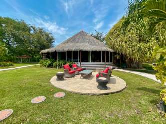 Decorative swan-filled lake on lush property in Chame Panama, ideal for tourism development