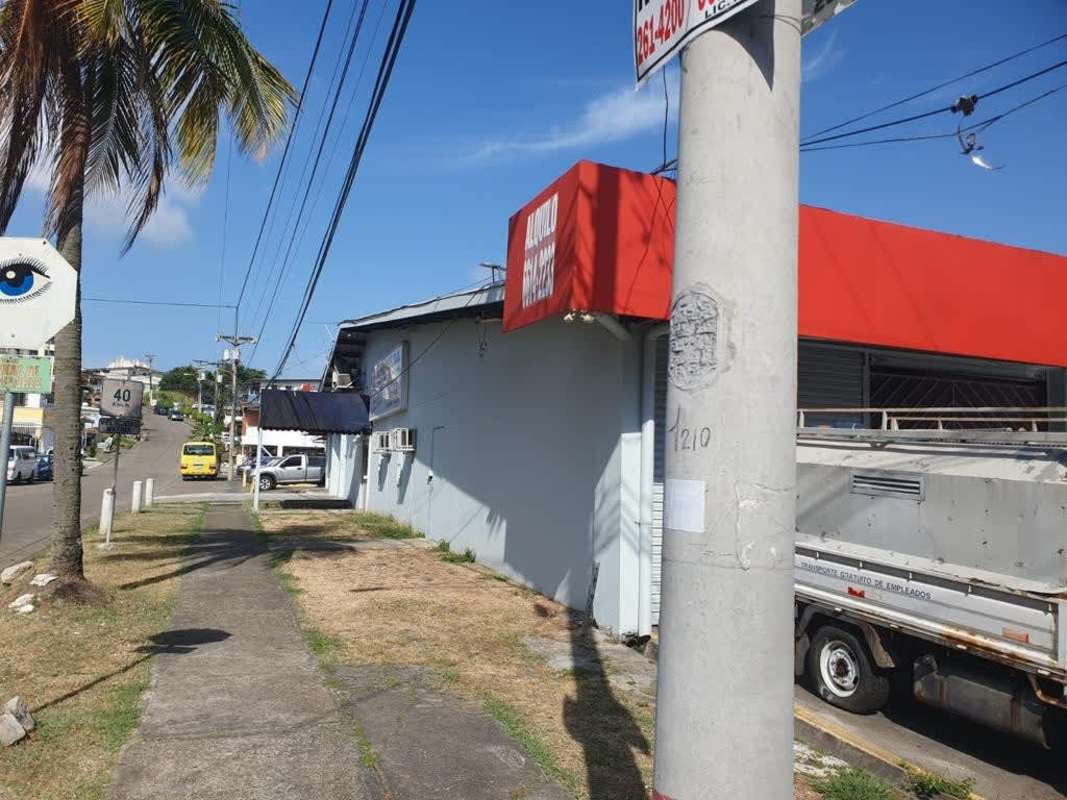 Commercial facade with warehouse and retail units Betania Panama City busy avenue