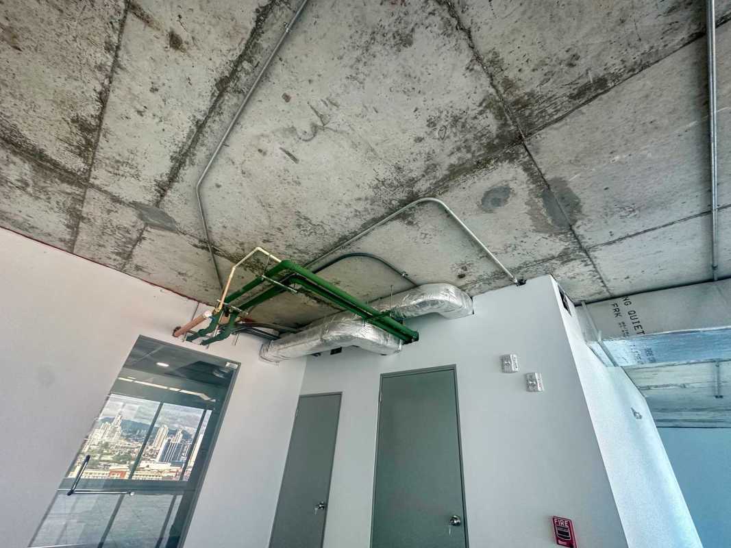 Commercial industrial space exposed ceilling ductwork city view Oceania Business Plaza Punta Pacifica Panama