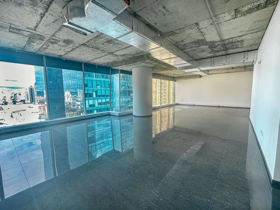 Spacious empty office with large windows industrial ceiling panoramic view Oceania Business Plaza Panama