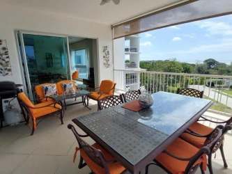 Large oceanfront terrace with outdoor dining set, sofas, panoramic Pacific view at Bijao Panama