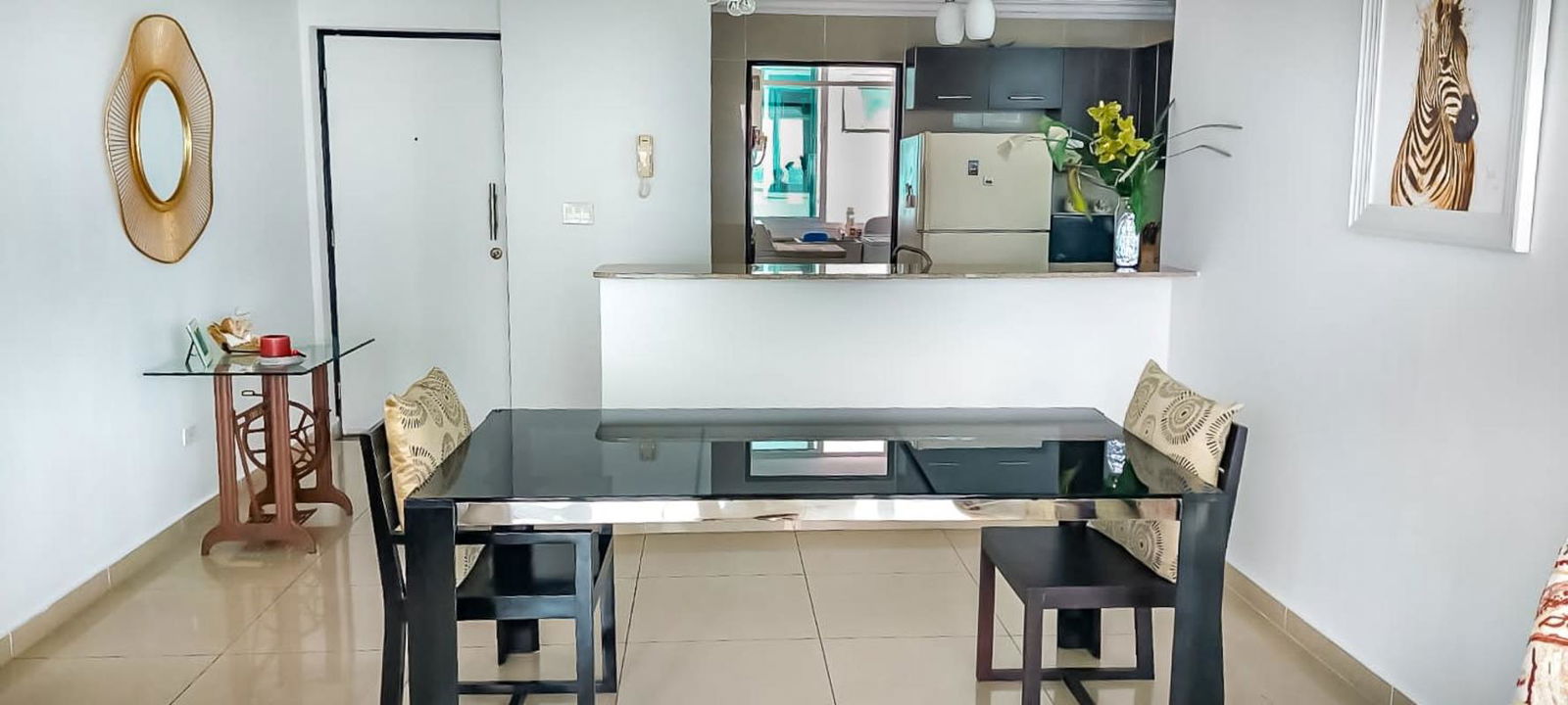 Modern kitchen with granite countertop and dining area PH Park Lane Panama City