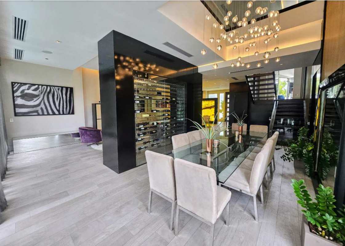 Gourmet kitchen with center island, high-end appliances in luxury home Altos del Golf Panama