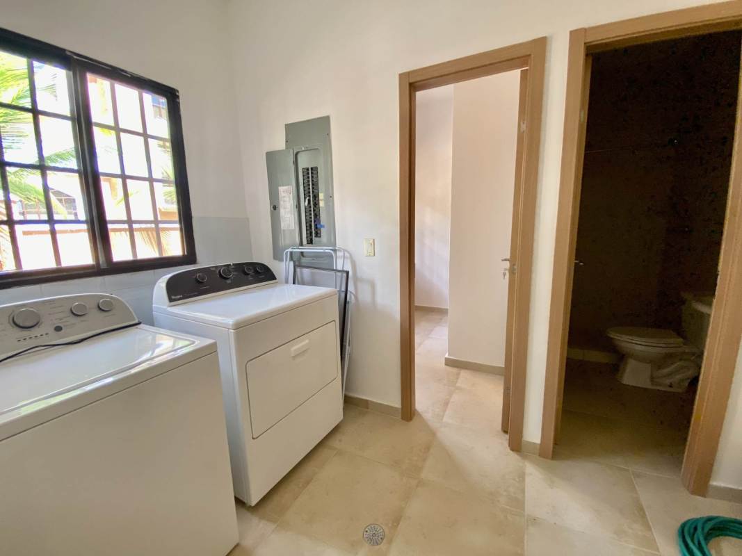Laundry room bathroom window washer dryer tile floor Clayton Village Panama