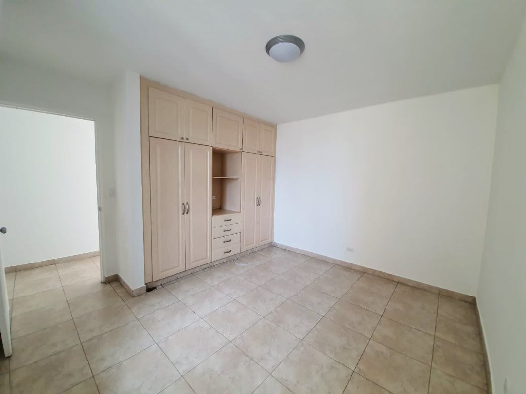Master bedroom featuring walk-in closet, ensuite bathroom and city skyline view in PH Mystic Point Punta Pacifica