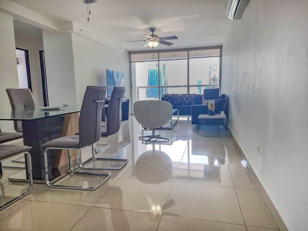 Large bedroom with built-in closet and city skyline views in PH River Park Obarrio Panama