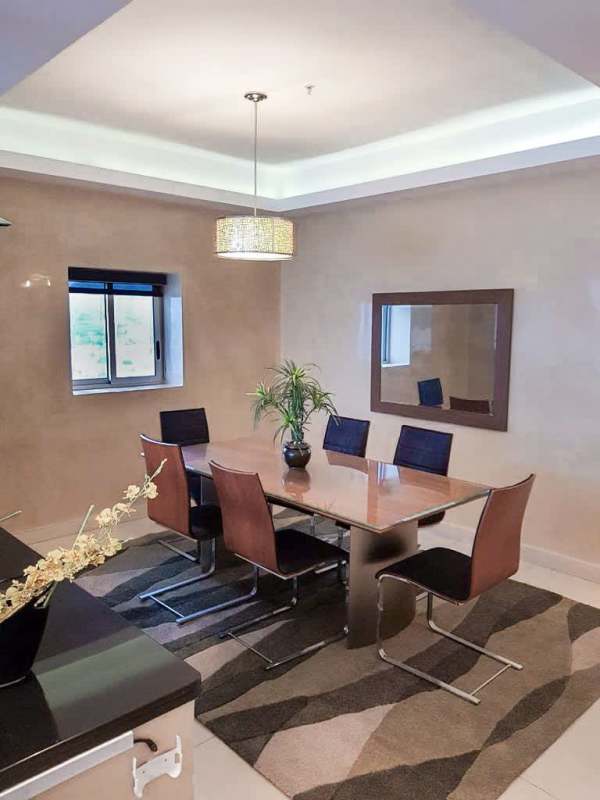 Modern bathroom with soaking tub, shower and city views in PH Rivage Avenida Balboa