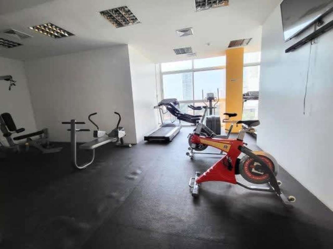Modern gym with cardio strength equipment large windows PH Sky Level Panama