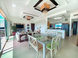 Master suite with large windows and ocean view Punta Barco Village Panama