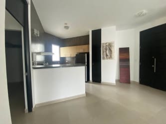 Modern open kitchen tile flooring white cabinets PH Founders Playa Blanca Panama